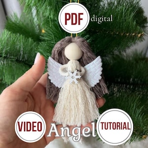 May include: A handmade angel ornament featuring a smooth wooden bead head, brown yarn hair, and a cream-colored fiber dress. The angel has white glittery wings and holds a small white snowflake. Text overlays read PDF digital, VIDEO, and TUTORIAL.