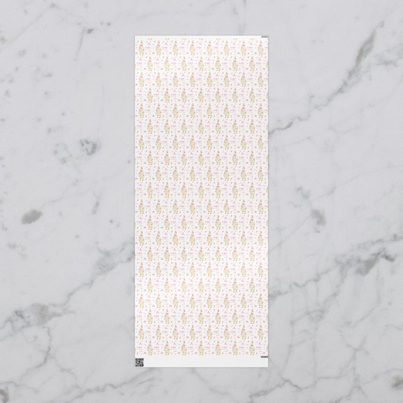 May include: A rectangular sheet with a repeating pattern of gold-colored figures and pink accents on a white background. The figures appear to be stylized, possibly representing people or objects. The sheet is positioned vertically.