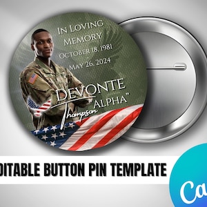 May include: A green and white button pin with a photo of a man in a military uniform. The text on the pin reads "In Loving Memory, October 18, 1981 - May 26, 2024, Devon Thompson "Alpha""