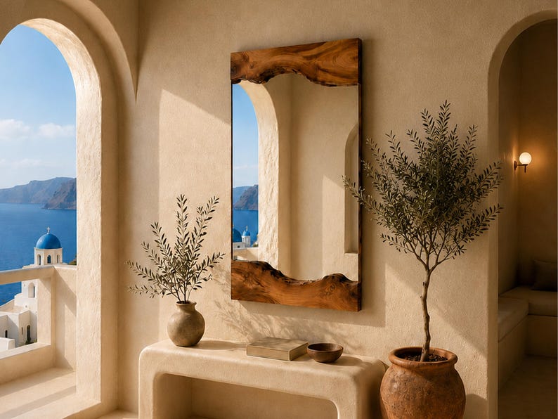 May include: A rectangular wall mirror featuring a natural live edge wood frame with organic, uneven contours on the top and bottom edges. The reflective glass surface is framed by dark brown, textured wood grain, mounted on a smooth beige wall.