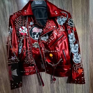 Rebel Stitchwork Crimson Howl Men’s Red Leather Jacket with Skull Insignia & Chain Laced Sleeves