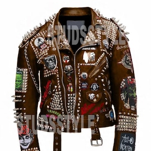 May include: Brown leather jacket adorned with silver studs and patches. The jacket is covered in various patches, including skull and band logos. The back of the jacket features a graphic with the text "THE ROCKS" and "PUNK!!".