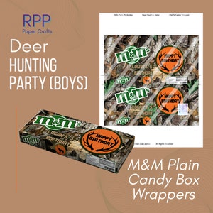 May include: A printable sheet and a physical sample of M&M candy box wrappers featuring a camouflage pattern, orange circles with black deer antlers, and the text "Happy Birthday" and "Logan's 5th Birthday" with a small deer silhouette icon.