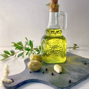 Sicilian olive oil. Vegan. Organic oil. Ecologic friendly product. EVO. Cold press oil. Wellness.