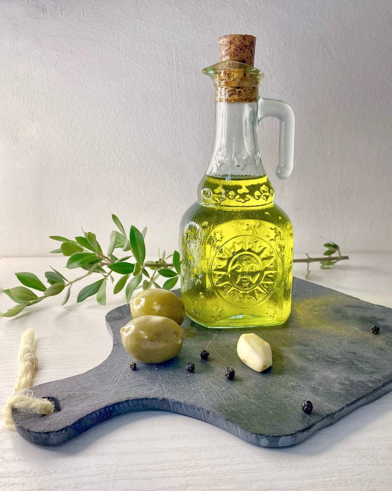 Sicilian olive oil. Vegan. Organic oil. Ecologic friendly product. EVO. Cold press oil. Wellness.