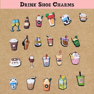May include: A selection of colourful drink-themed shoe charms. The charms depict champagne glasses, beer bottles, coffee cups, milk cartons, and other beverages. The text "DRINK SHOE CHARMS" is displayed at the top.