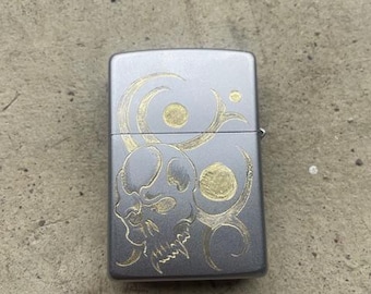 cosmic tribal skull engraved zippo
