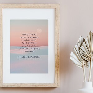 May include: A framed print with a quote by Nelson Mandela: "Live life as though nobody is watching, and express yourself as though everyone is listening."