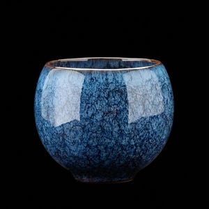 May include: A rustic wooden sign with the text "Welcome to our home" in white lettering. The sign features a distressed finish and a simple, inviting design, perfect for entryway decor.