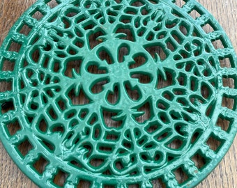 Cast iron trivet pot stand painted green