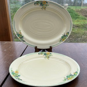 A pair of Crown Ducal art deco meat plates