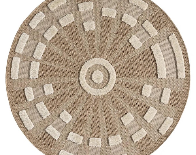 Natural colored, white round jute rug, machine made. Durable and easy to clean.