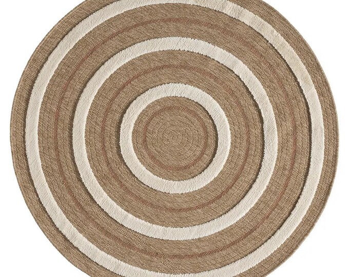 Orange colored round decorative rug, jute circular design, machine-made rug.