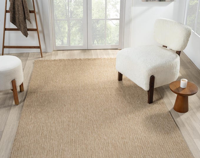 Beige, simple patterned, durable jute rug.