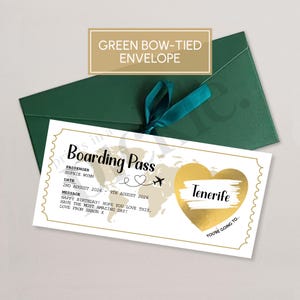 May include: A boarding pass design with a gold heart that says "Tenerife". The pass is on a white background with a world map and the text "Boarding Pass". It is inside a green bow-tied envelope.