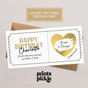 May include: A white birthday scratch card with gold text and a gold heart that says "A week in Tenerife!". The card is personalised with the name "Charlotte" and comes with a brown envelope. The card reads "Happy Birthday Charlotte, Go and make some memories! Love Mum & Dad."