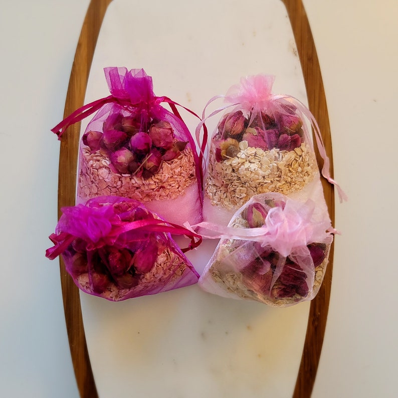 Indulge in the Romance of our Rose Bath Sachet Bundle - Epsom Salt and Oats Infused with Fragrant Rose Herbs for a Soothing Bath Ritual. Caution: Herbs may accumulate in the tub; do not open the sachet for an optimal bathing experience
