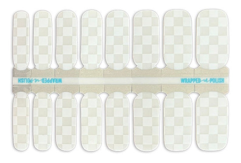 May include: A set of 10 white nail wraps with a checkered pattern. The wraps are designed to be applied over nail polish and are packaged in a clear plastic sheet with the text "WRAPPED 4 U POLISH" printed on it.