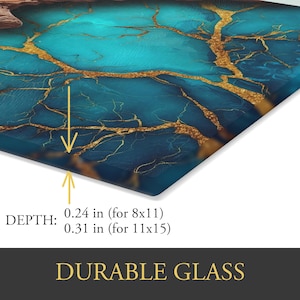 May include: Durable glass with a teal and gold abstract design. The depth is 0.24 inches for an 8x11 size and 0.31 inches for an 11x15 size. The design features gold veins across a teal background. The text "DURABLE GLASS" is at the bottom.
