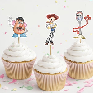 May include: Three cupcakes with white frosting and pink liners. Each cupcake has a different character from the Toy Story movie on top: Mr. Potato Head, Jessie, and Forky.