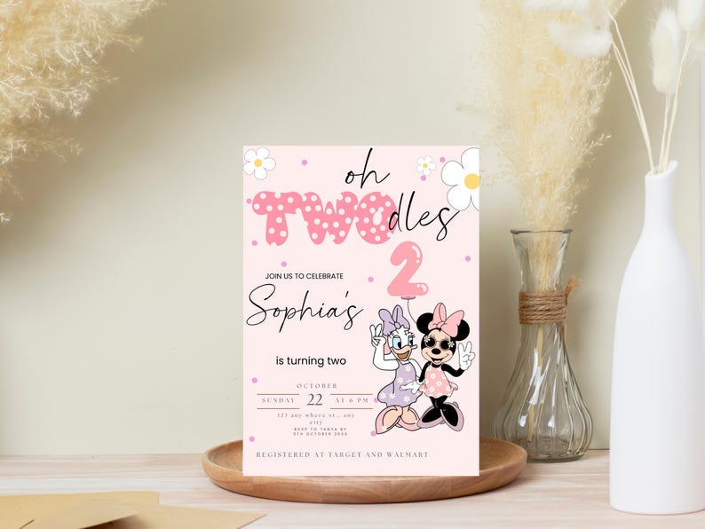 May include: A pink birthday invitation with the text "oh TWOdles" and "Sophia's is turning two." Features Daisy Duck and Minnie Mouse. Includes date and time details. Decorated with flowers and a pink balloon.