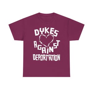 dykes against deportation shirt barbed wire heart tee queer immigrant solidarity abolish ice apparel lesbian protest wear radical pride lgbt migrant justice class war clothing no human illegal activist anti fascist leftist t shirt pride 2025 queer mutual aid detention abolition free them all anti border tee socialist pride unisex graphic the first pride was a riot stonewall t-shirt radical queer liberation no human being is illegal abolish ice abolish borders lesbian anarchist queer anarchism