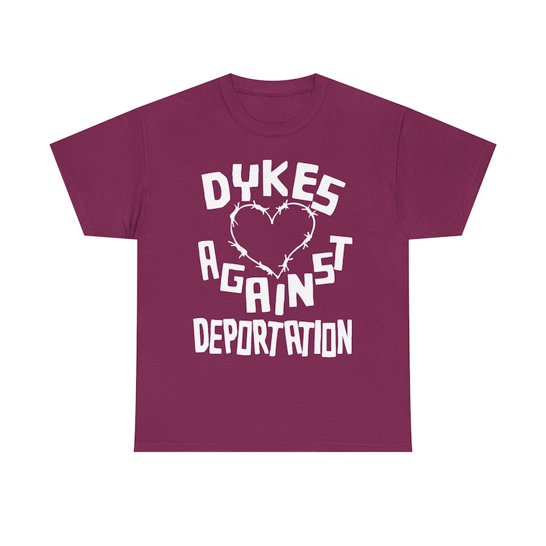 dykes against deportation shirt barbed wire heart tee queer immigrant solidarity abolish ice apparel lesbian protest wear radical pride lgbt migrant justice class war clothing no human illegal activist anti fascist leftist t shirt pride 2025 queer mutual aid detention abolition free them all anti border tee socialist pride unisex graphic the first pride was a riot stonewall t-shirt radical queer liberation no human being is illegal abolish ice abolish borders lesbian anarchist queer anarchism