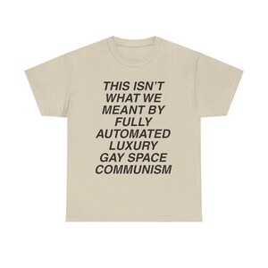 luxury gay space communism pride shirt this isnt what we meant tee queer leftist meme shirt lgbt pride space tourism parody anti billionaire gay space communism meme doomcore weirdcore sarcastic funny protest t shirt pride meme apparel nihilist humor class war clothing blue origin parody katy perry space flight satire fully automated luxury gay space communism quote queer liberation pride month shirt socialist anarchist activist tee soft cotton unisex union printed