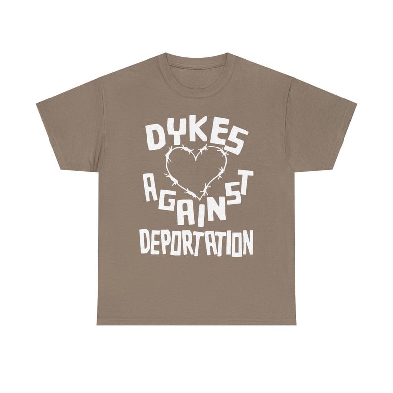 dykes against deportation shirt barbed wire heart tee queer immigrant solidarity abolish ice apparel lesbian protest wear radical pride lgbt migrant justice class war clothing no human illegal activist anti fascist leftist t shirt pride 2025 queer mutual aid detention abolition free them all anti border tee socialist pride unisex graphic the first pride was a riot stonewall t-shirt radical queer liberation no human being is illegal abolish ice abolish borders lesbian anarchist queer anarchism
