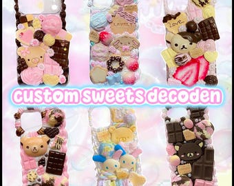 May include: Six phone cases decorated with miniature faux sweets, including chocolate bars, cookies, strawberries, and bear-shaped charms, arranged in a grid. The text "CUSTOM SWEETS DECODEN" is centered in light blue with a white outline.