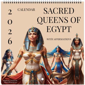 May include: A 2026 calendar with illustrations of Egyptian queens. The cover reads "Sacred Queens of Egypt with Affirmations." The artwork depicts women in elaborate headdresses and jewellery, using a colour scheme of gold, blue, and white.