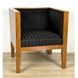 Stylish square-shaped armchair made of natural cherry wood