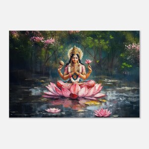 May include: A painting depicting a Hindu goddess seated in a lotus position on a pink lotus flower. She is adorned in a pink and gold outfit and wears a crown. The background features a verdant forest with a pond.