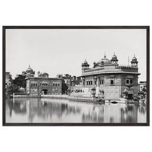 May include: A black and white photograph of a large, ornate building with a reflecting pool in front of it. The building has multiple domes and towers and appears to be a religious structure.