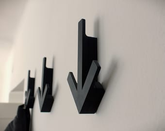 Moderne kleerhangers, eigentijdse muurhaken