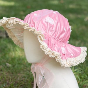 Sombrero de botón con forma de champiñón, color rosa con lunares blancos, decorado con cordones y cintas de algodón, para adultos o niños.