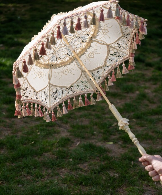 Lot - A vintage Burberry umbrella with wooden crook handle; together