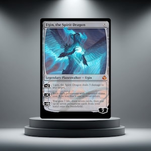 May include: A Magic: The Gathering trading card titled Ugin, the Spirit Dragon. The card features a blue-toned illustration of a winged dragon-like entity holding a glowing orb. It includes text detailing abilities, a mana cost of 8, and loyalty 7.