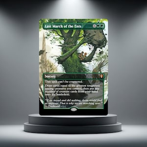 Peut inclure: Une carte à collectionner rectangulaire intitulée Last March of the Ents représentant une grande créature arboricole couverte de mousse soulevant un rocher. Deux petits personnages sont assis dans ses branches. Le texte inclut Sorcery et une citation.