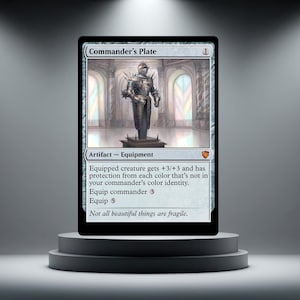 May include: A Magic: The Gathering card named "Commander's Plate." The card shows a detailed illustration of a suit of armour. The card is an artifact-equipment. The text on the card describes its abilities and includes the quote, "Not all beautiful things are fragile."