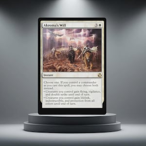 May include: A Magic: The Gathering card named "Akroma's Will" with a fantasy illustration. The card includes text detailing its effects. The card is presented on a grey pedestal against a plain backdrop.
