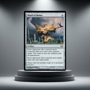 May include: A Ward of Bones trading card featuring a tan skull with antlers mounted on a wooden post in a graveyard. The card text reads: Each opponent who controls more creatures than you can't cast creature spells. Mages dare not attempt magic.