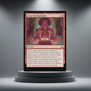 May include: A red Magic: The Gathering card titled "Seize the Spotlight." The card features a sorcery spell with a woman in a red dress inside a triangle. The card is displayed on a grey pedestal.