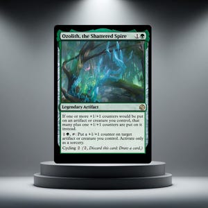 May include: A green Magic: The Gathering card, "Ozolith, the Shattered Spire," on a grey pedestal. The card depicts a forest scene with blue and green hues. Text describes the card's abilities and game mechanics.