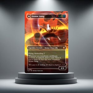 May include: A rectangular trading card titled Avatar Aang featuring a character with a glowing arrow on their forehead surrounded by swirling orange fire and floating rocks. The card displays game text, mana symbols, and a power/toughness of 4/4.