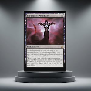 May include: A black Magic: The Gathering card labelled "Bloodchief Ascension" showing a dark figure with outstretched arms against a red and purple backdrop. The card is an enchantment with game text below the title.