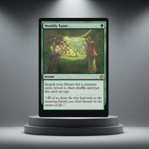 May include: A green "Worldly Tutor" Magic: The Gathering card. The card features an illustration of hands holding a geometric shape with a green background. The card text includes instructions and a quote.