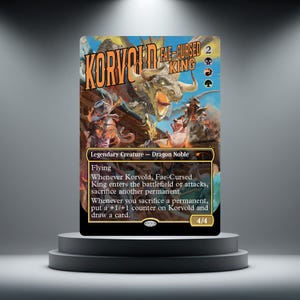 May include: A Magic: The Gathering card depicting "Korvold, Fae-Cursed King." The card shows a dragon and other characters in a vibrant illustration. The text includes "Legendary Creature - Dragon Noble" and game rules. The card is presented on a tiered plinth.