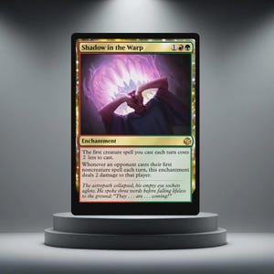 May include: A Magic: The Gathering card named "Shadow in the Warp." The card shows a surreal illustration of a figure with a glowing, purple energy emanating from their head. The card is displayed on a grey pedestal.