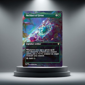 May include: A Magic: The Gathering trading card titled Necklace of Girion, a legendary artifact. The artwork depicts a metallic pendant with a central green gemstone resting on a pile of coins. The card text includes game rules and mana cost.
